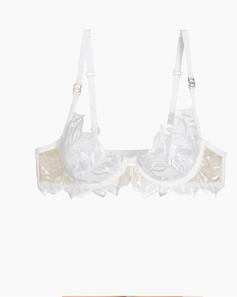 White embroidered lace bra with adjustable straps and underwire. Sweet and seductive lingerie.