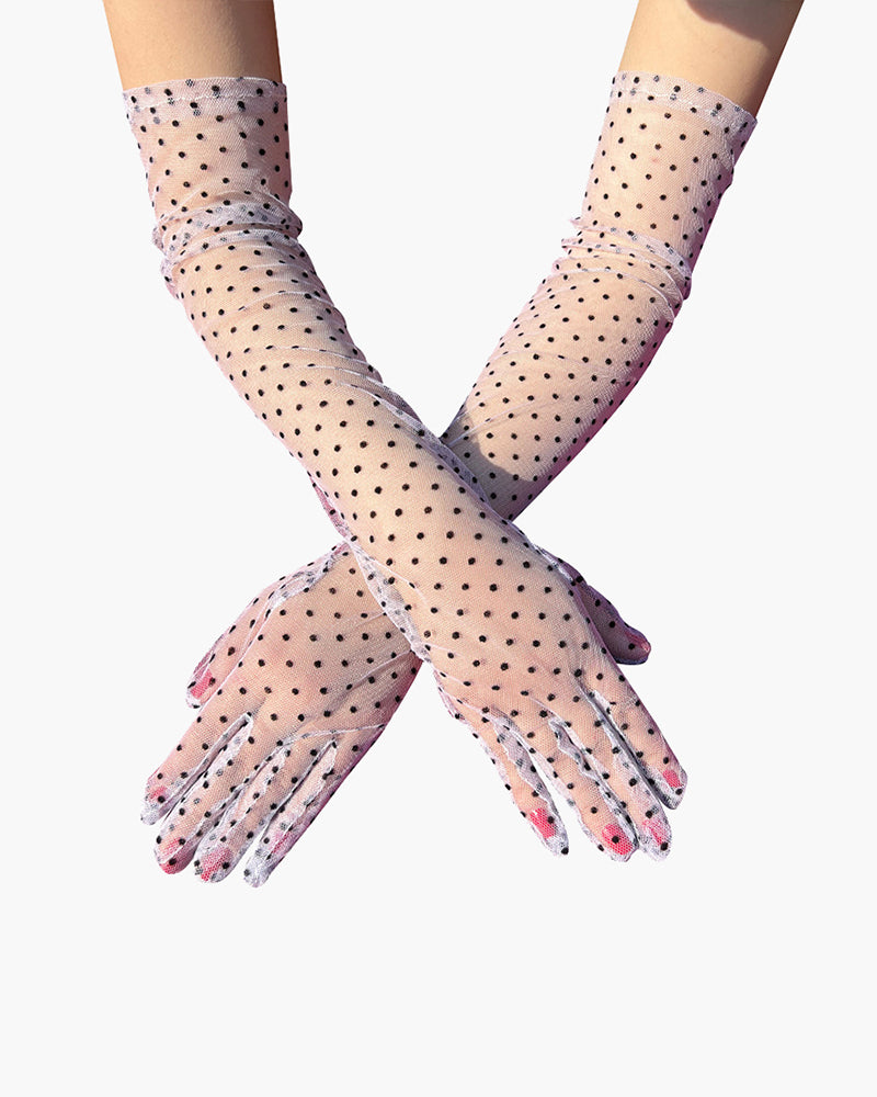 Retro polka dot gloves in sheer mesh with lace trim, adding a touch of elegance and style.