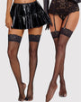 Black fishnet thigh-high stockings with lace trim, paired with lingerie and skirt.