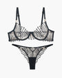 Black lace lingerie set. Embroidered bra and panty with adjustable straps and a seductive design.