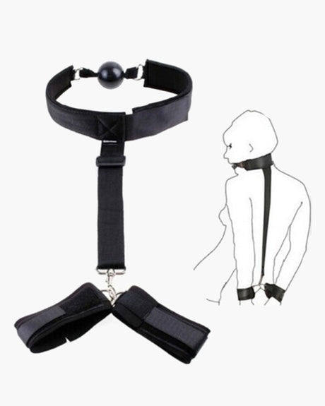 Black adjustable strap set with mouth gag and wrist restraints for intimate sessions