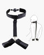 Black adjustable strap set with mouth gag and wrist restraints for intimate sessions