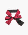 Adjustable satin eye mask in red and black, ideal for meditation, travel, or romantic use