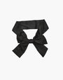 Black satin eye mask kit, adjustable for meditation, travel, or romantic use. Soft, elegant design.