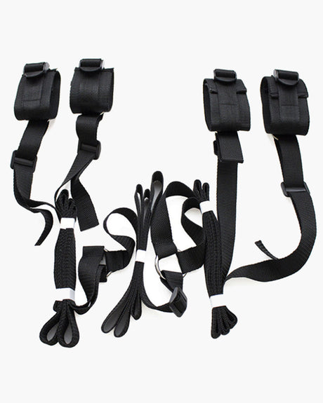 Black SM sex toy restraint band set with adjustable cuffs and straps for intimate exploration.