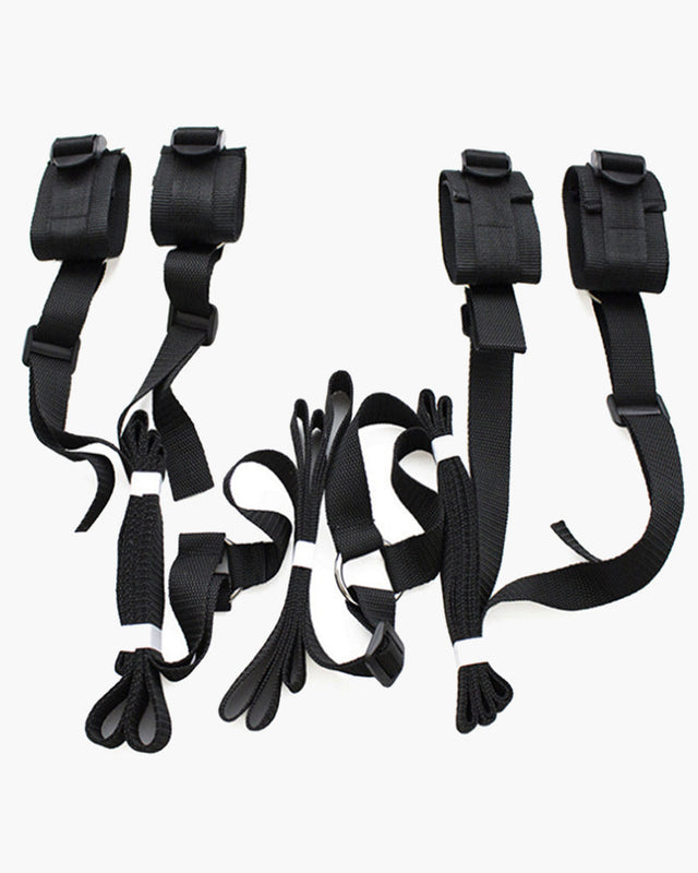 Black SM sex toy restraint band set with adjustable cuffs and straps for intimate exploration.