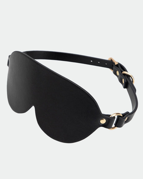 Black leather sunshade eye mask with gold hardware for intimate sessions