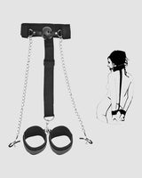 Black SM bondage set with gag ball, neck strap, chains, and wrist cuffs for sensual exploration.