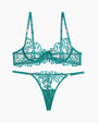 Teal lace bra and thong set with floral embroidery. Adjustable straps. Seductive lingerie.