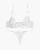 White lace bra and thong set. Embroidered, adjustable straps, underwire. Sweet lingerie.