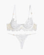 White lace bra and thong set. Embroidered, adjustable straps, underwire. Sweet lingerie.