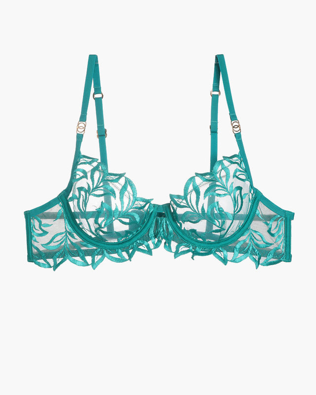 Embroidered lace bra in teal with floral design, adjustable straps, and underwire.