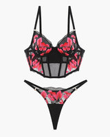 Embroidered black corset bra and thong set with pink floral details, sweet and seductive lingerie