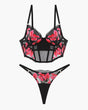 Embroidered black corset bra and thong set with pink floral details, sweet and seductive lingerie