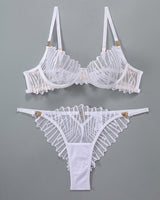 White lace lingerie set with adjustable straps and embroidered details, sweet yet seductive.