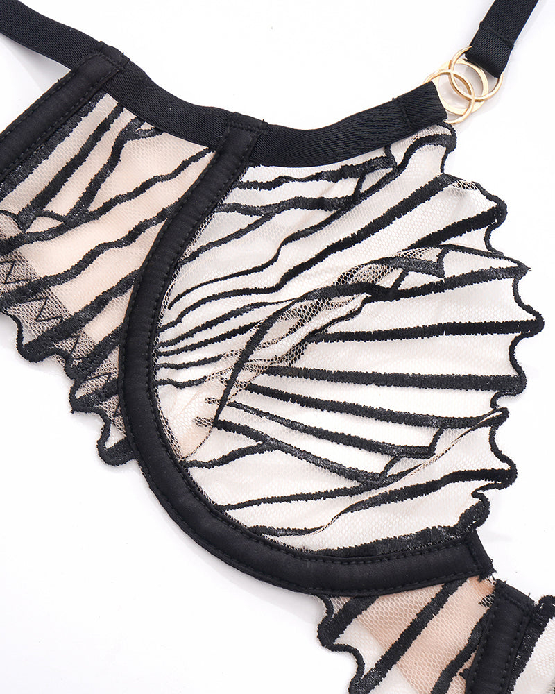 Black embroidered bra with adjustable straps and delicate lace details, sweet yet seductive