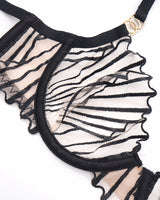 Black embroidered bra with adjustable straps and delicate lace details, sweet yet seductive