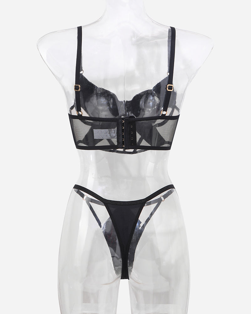 Black mesh bra and thong set with adjustable straps and lace details. Sweet and seductive lingerie.