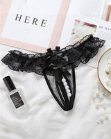 Black beaded lace crotchless panty with faux pearls, low rise design, and strap accent