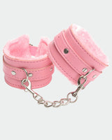 Pink plush leather handcuffs with silver chain, perfect for role play and intimate moments.