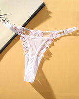 White low waist thong panties with pink floral embroidery, sexy lingerie with adjustable straps.