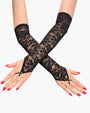 Elegant black lace fingerless gloves with floral pattern, perfect for adding a touch of mystery.