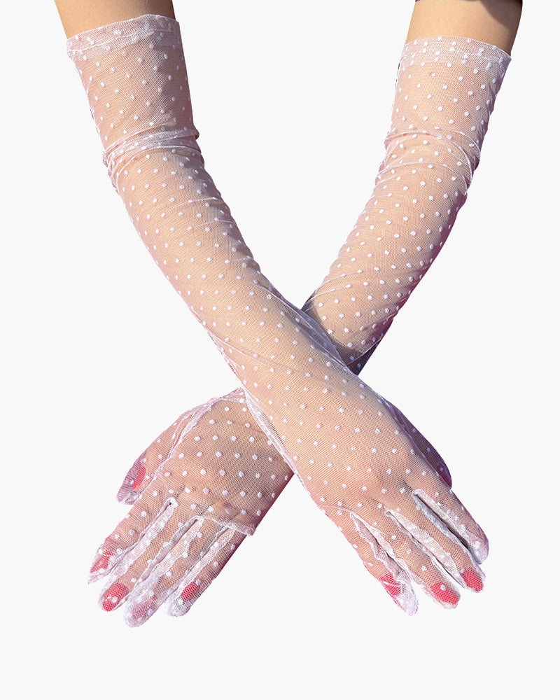 Retro polka dot gloves in sheer mesh with lace trim, adding elegance and style to any outfit.