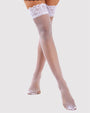 White fishnet thigh-high stockings with lace trim. Sexy and comfortable lingerie for women.