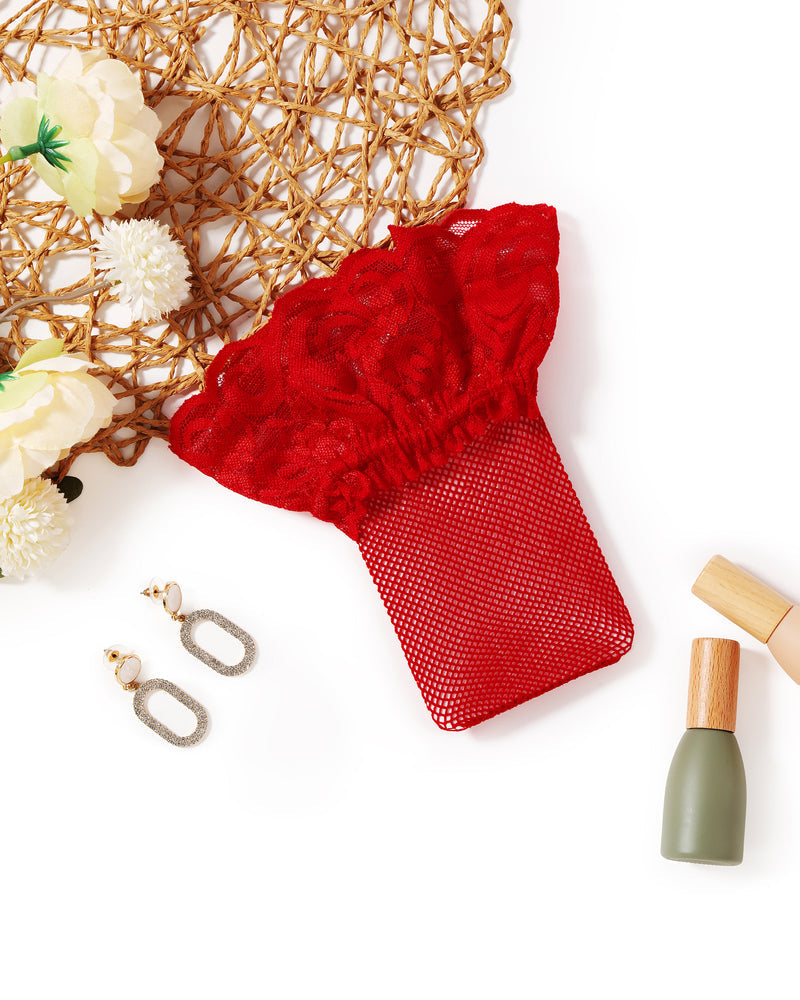 Red fishnet thigh-high stocking with lace trim, perfect for adding a touch of sexy to any look