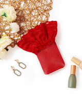 Red fishnet thigh-high stocking with lace trim, perfect for adding a touch of sexy to any look